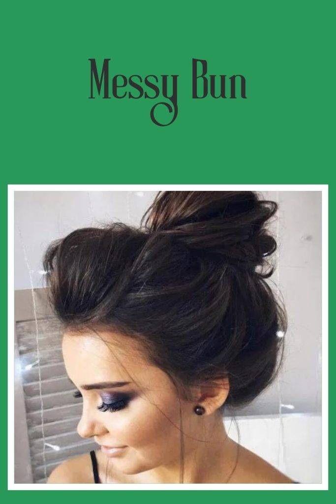 A girl with dark eye makeup and Messy Bun - celebrity hairstylist