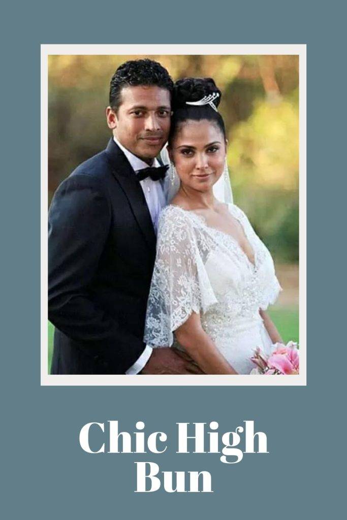 Lara Dutta in white wedding gown and Chic high bun with husband Mahesh Bhupati in black suit - soft curls bridal hairstyle