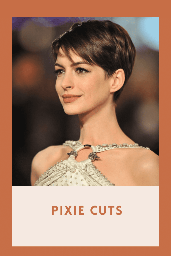 A beautiful girl in off white dress designed with stones showing the side view of her pixie cuts - hairstyles for thin girls