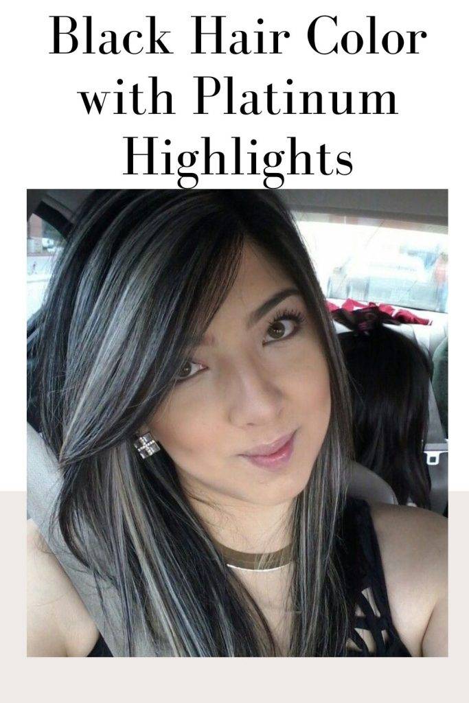 A girl in car posing for a selfie in black dress and Black hair color with platinum highlights - trending hair color 