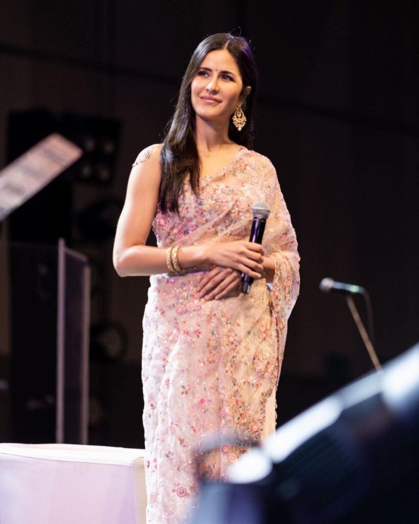 Katrina Kaif in floral pink saree standing on a stage - 30s women hairstyles