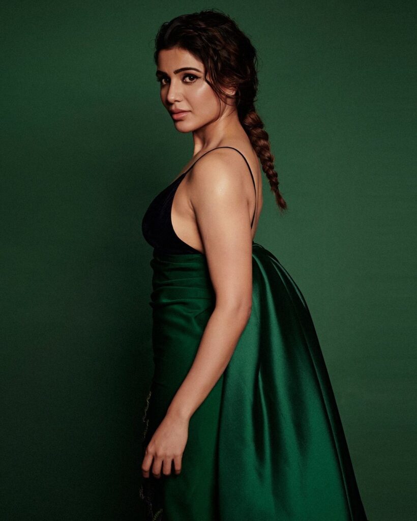 Samantha Ruth Prabhu in dark green off shoulder grown posing for camera and showing her Braid with Bangs hairstyle - Samantha hairstyles