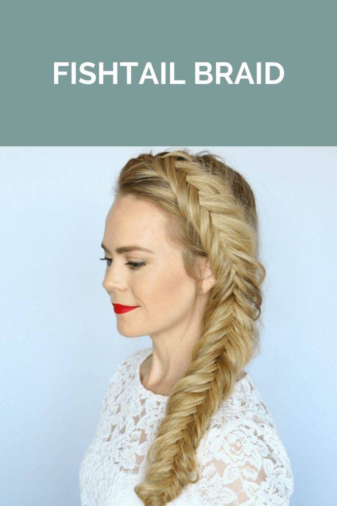 A girl in white dress with red lipstick showing her fishtail braid - braided hairstyle