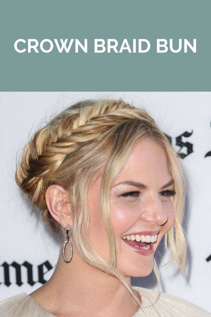 A smiling girl showing her side view of her crown braid bun - braided hairstyles