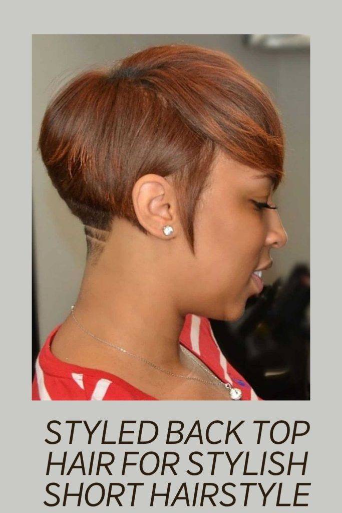 A girl in red and white stripes top showing the side view of her Styled Back Top Hair For Stylish Short Hairstyle - short haircut name