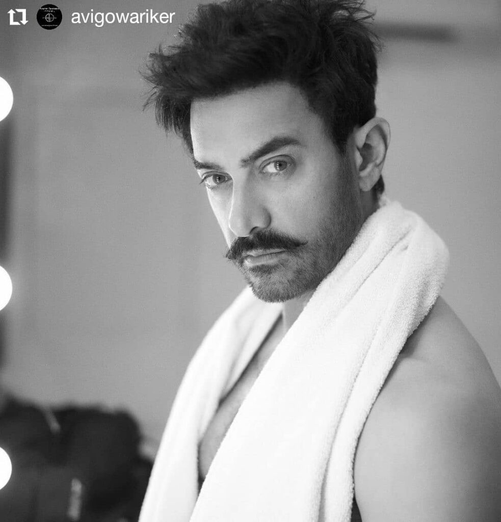 Shirtless Aamir Khan with a towel around his neck posing for camera and showing his Spikes with Mustache - aamir khan new hairstyle