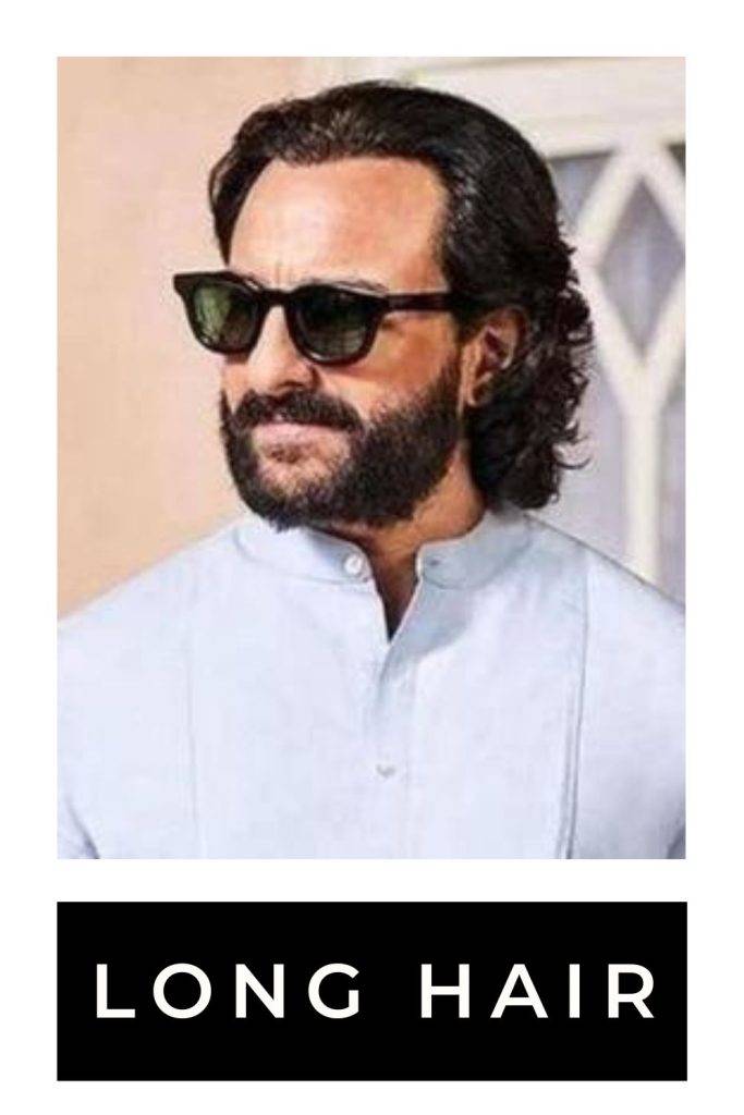 Saif Ali Khan in white kurta and googles posing for camera and showing the side view of his long hair - saif ali khan hairstyles