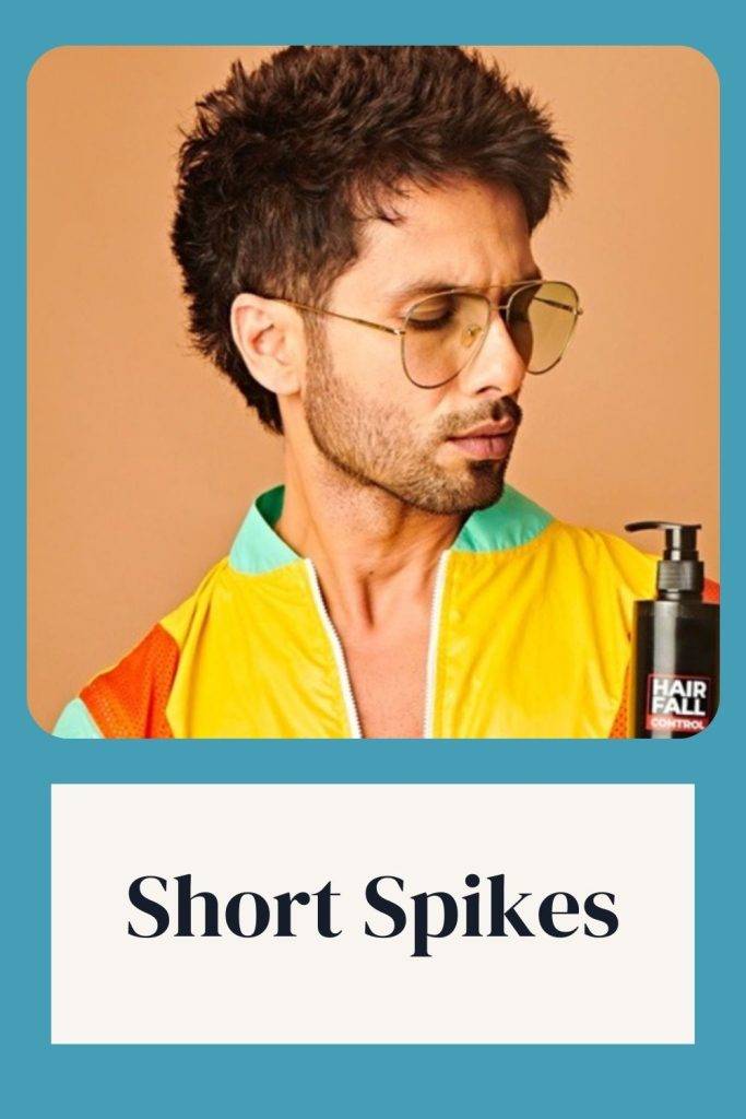 Shahid Kapoor in multicolor jacket with goggles showing the side view of his Short Spikes hairstyle - shahid kapoor hairstyle photos