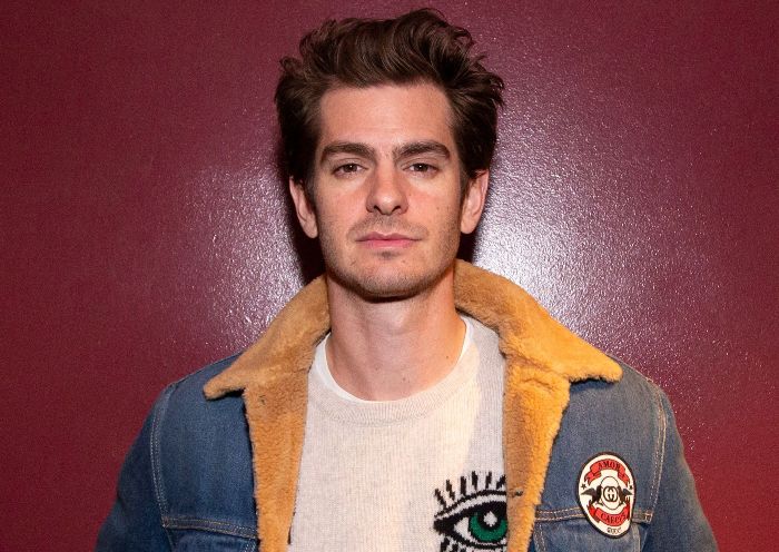 Andrew Garfield in blue denim jacket with white t-shirt showing his messy hair - Hollywood actors hairstyles