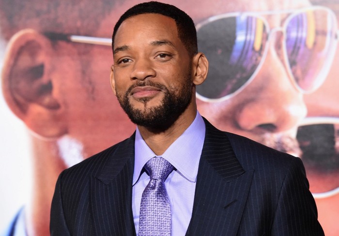 Will Smith in blue lining coat with sky blue shirt with matching tie posing for camera and showing his Buzz Cut - Hollywood actors hairstyles