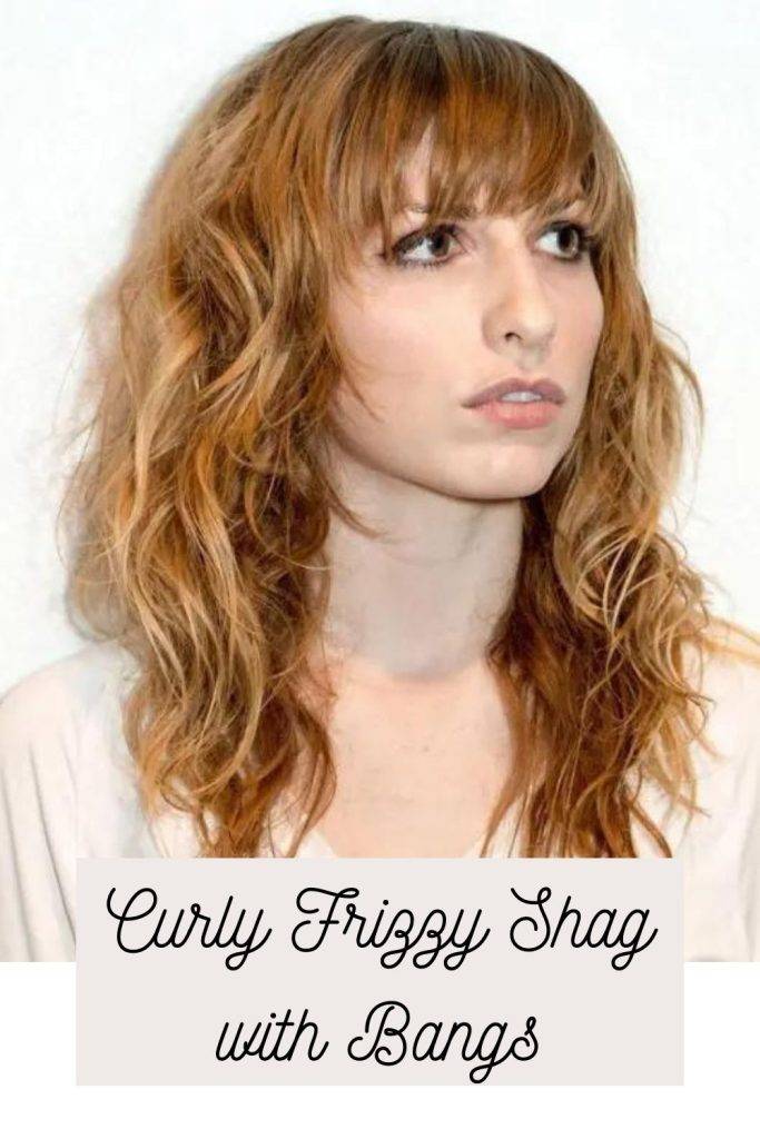 A girl in white deep neck top showing her curly Frizzy Shag with Bangs - haircuts for frizzy wavy hair