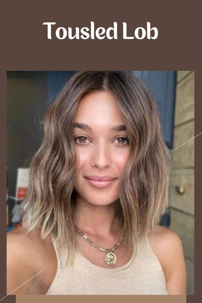 A girl in tank top with a necklace showing her Tousled Lob Haircut - trending haircuts