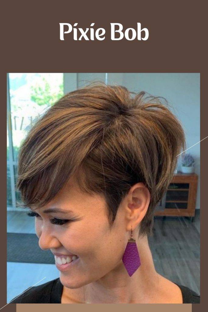 A smiling girl in black top and purple rarri9ngs posing for camera and showing the side view of her pixie bob - popular hairstyles for women 