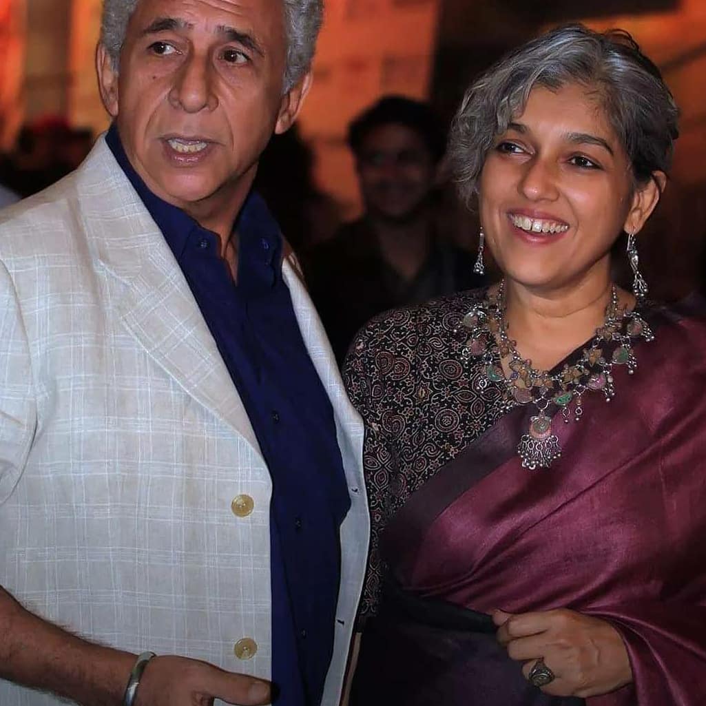 Naseeruddin Shah in white suit with blue short and Ratna Pathak Shah in maroon saree with necklace - Cancer compatibility friendship