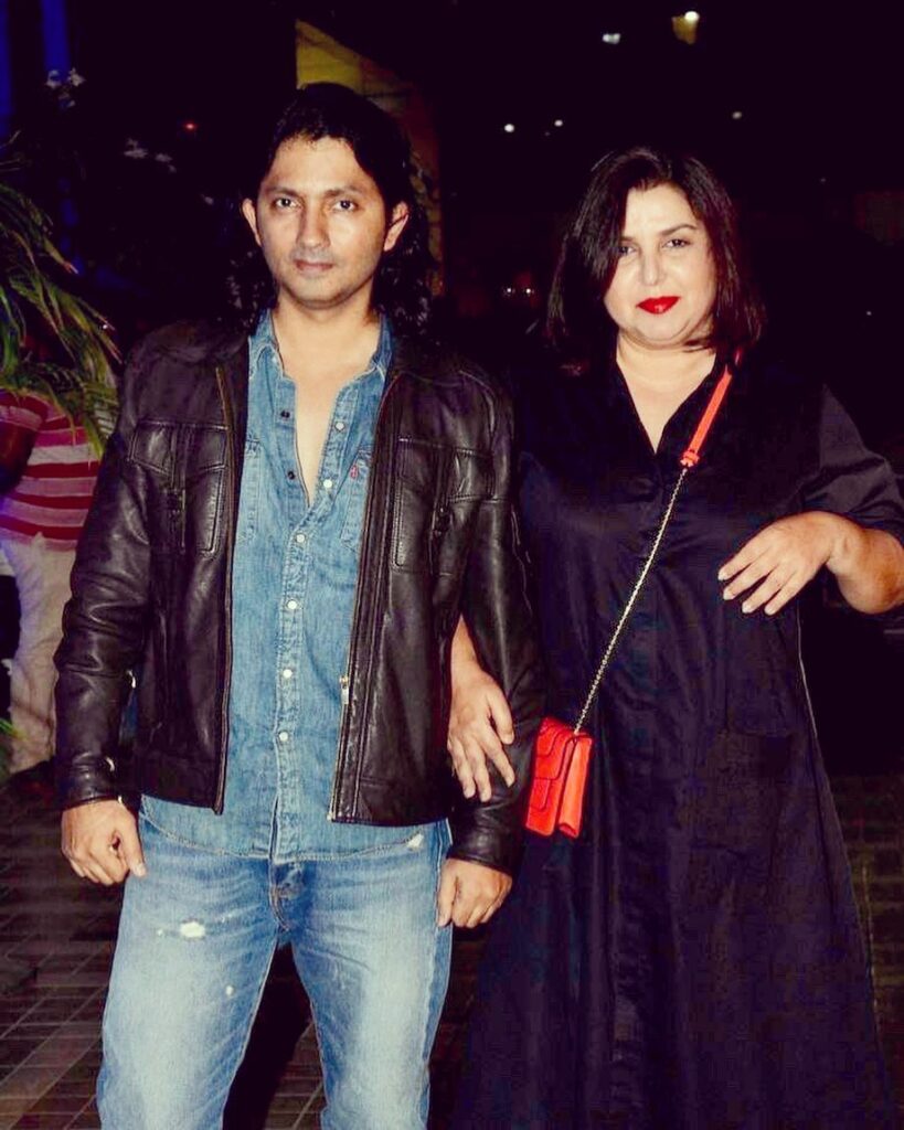 Farah Khan in black dress with red lipstick and Shirish Kunder in demin shirt jeans with black jacket - best match for Capricorn