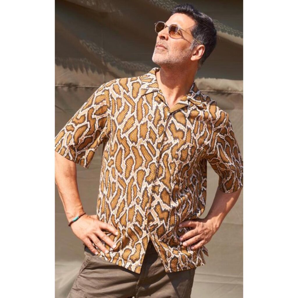 Akshay Kumar in Leopard printed half sleeves shirt posing for camera  - Bollywood actors latest hairstyles