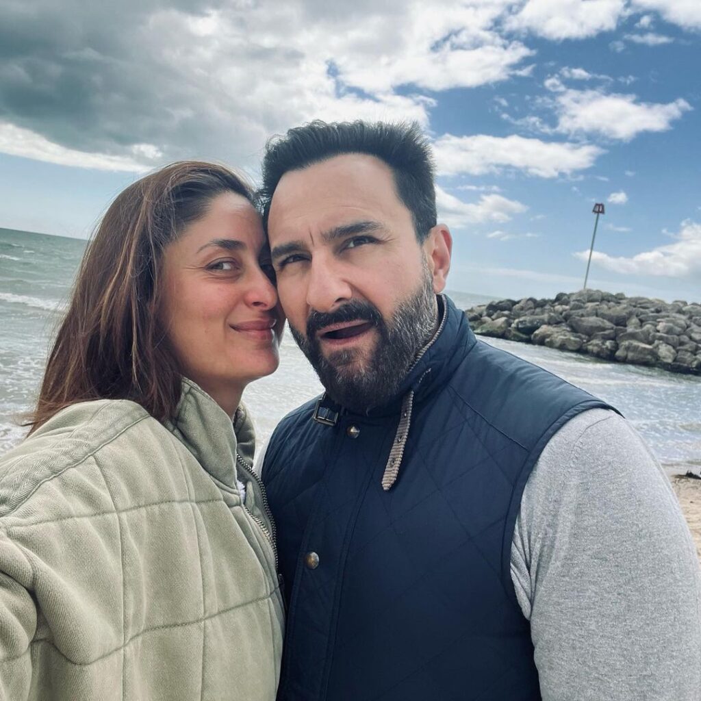 Saif Ali Khan in blue half jacket with grey sweater and Kareena Kapoor in grey jacket posing for a selfie - Indian Actors latest hairstyles