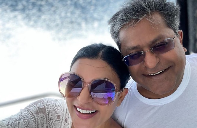 Sushmita Sen in white dress with goggles and Lalit Modi in white t-shirt with goggles posing for a selfie - Sushmita Sen affair
