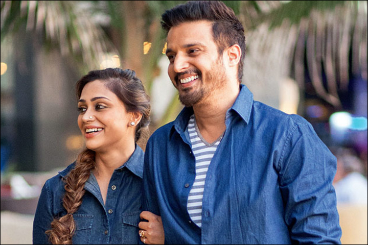 Jimmy Sheirgill and Priyanka Puri in matching blue denim shirts posing for camera - best partner for December born