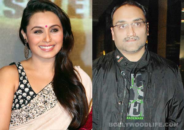 Smiling Rani Mukherjee in peach saree with black and white blouse and Aditya Chopra in black jacket - Aries compatibility