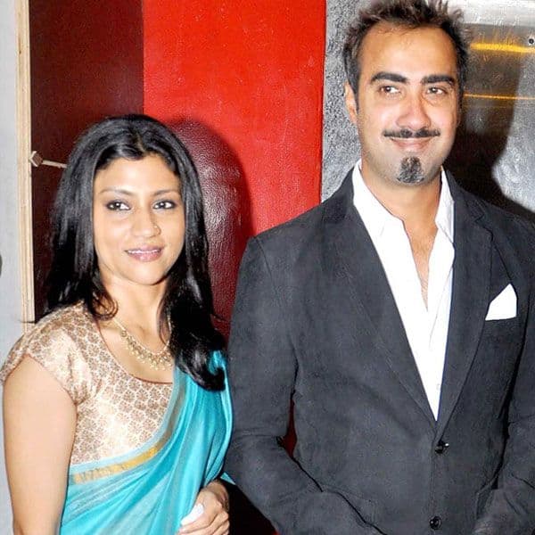 Ranvir Shorey in grey coat with white shirt and Konkona Sen Sharma in sky blue saree with golden blouse posing for camera - Leo compatibility friendship