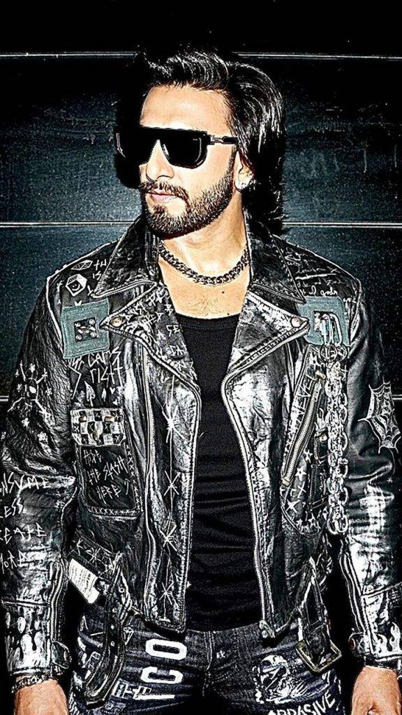 Ranveer Singh in leather jacket with black inner and goggles - Ranveer Singh beard style name