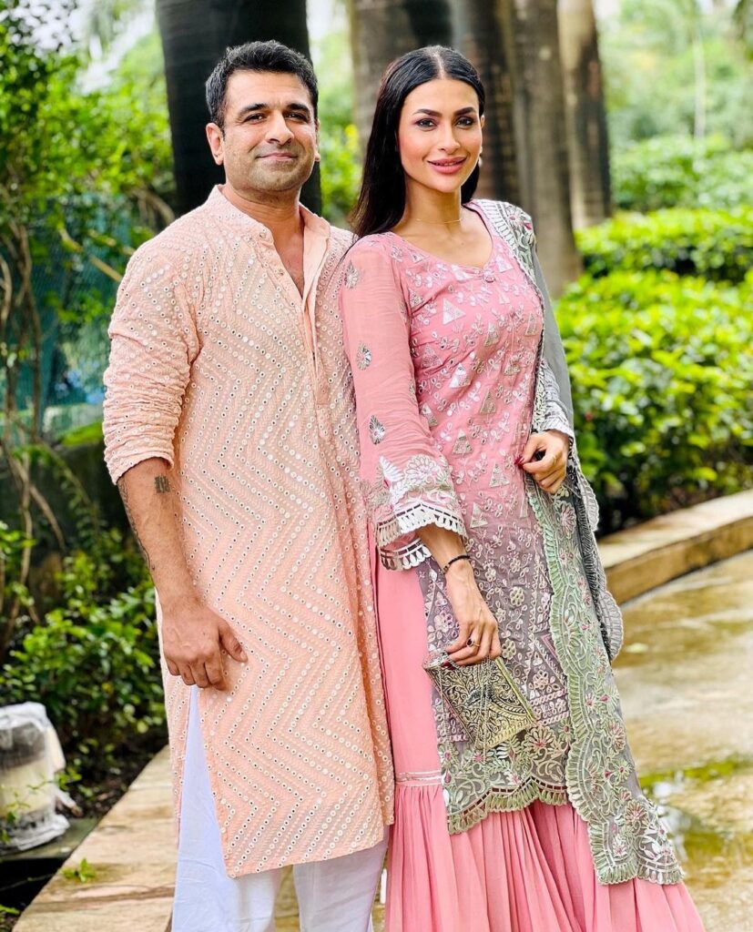 Eijaz Khan and Pavitra Punia in matching pink traditional outfit posing for camera - Virgo compatibility