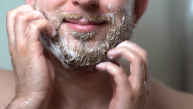 A man is washing his beard - Ranveer Singh beard look