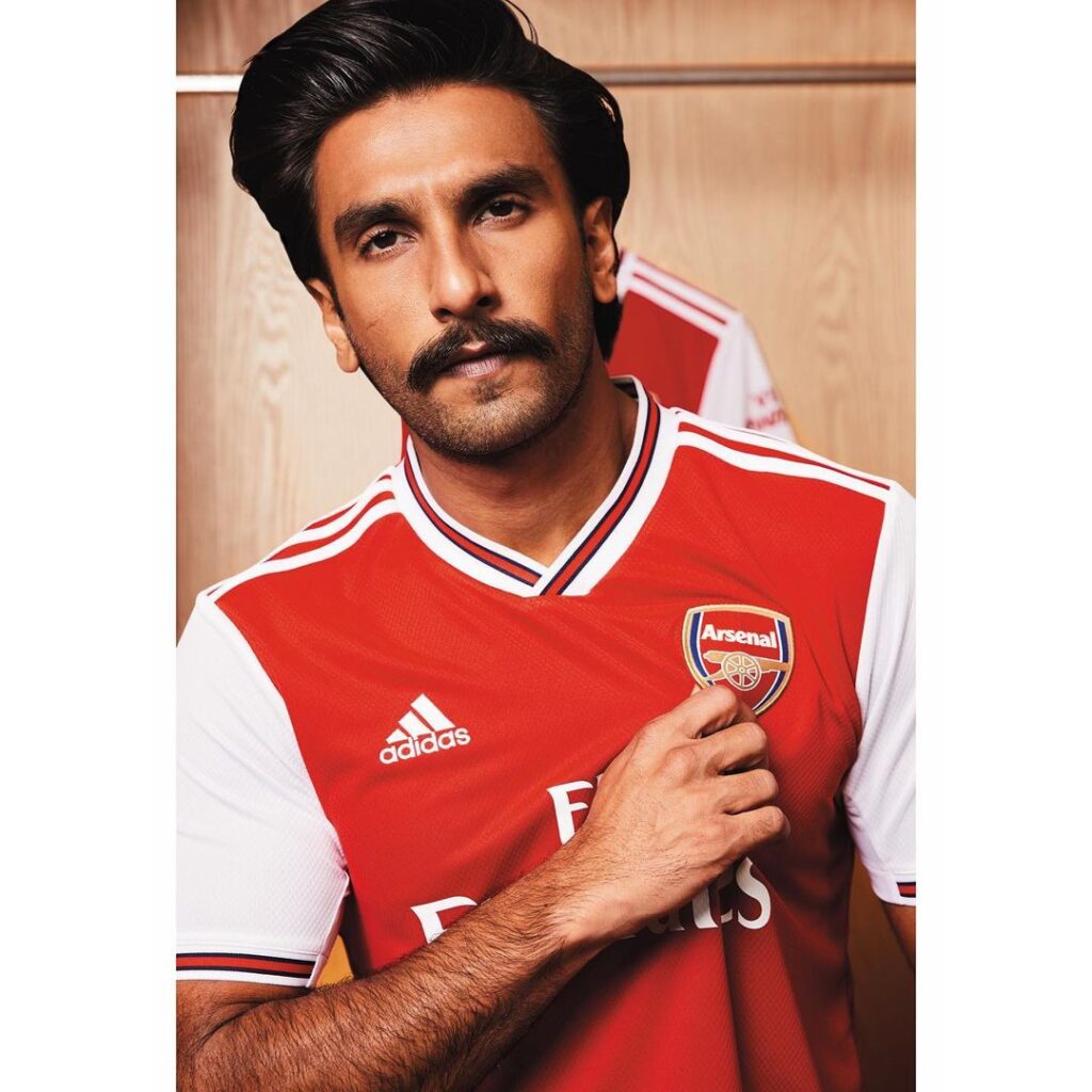 Ranveer Singh in red and white t-shirt and thick bushy mustache - Ranveer Singh beard look