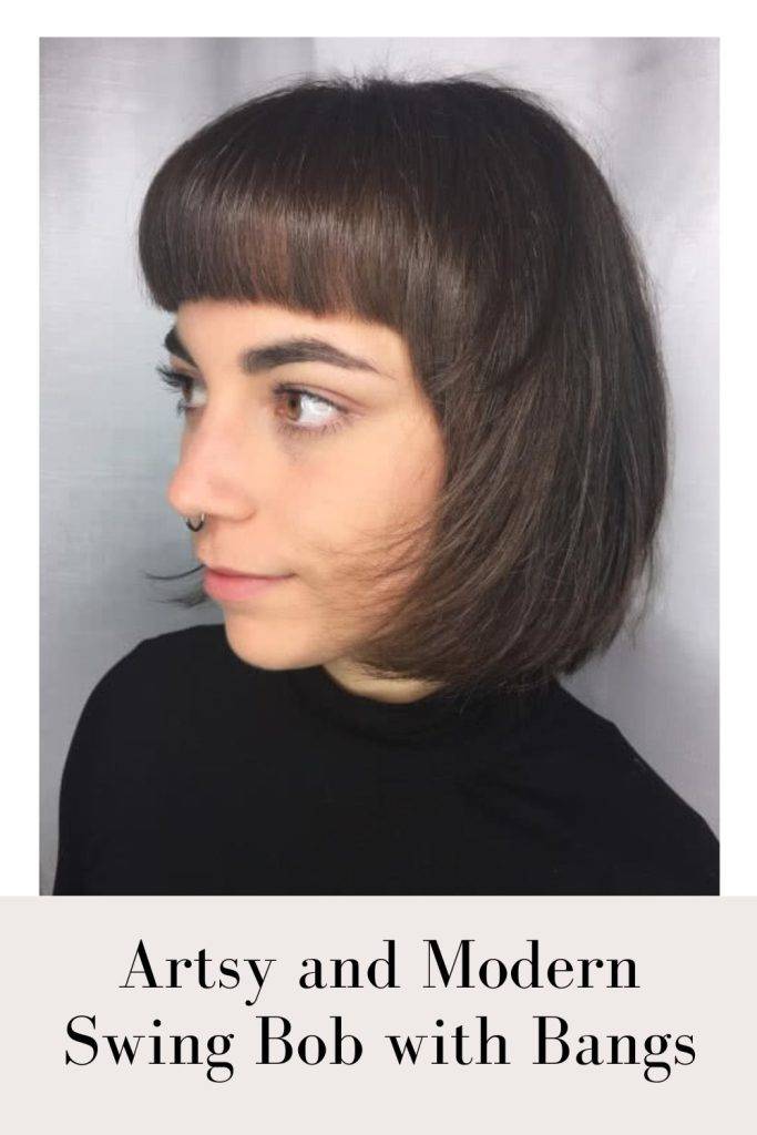 Woman in black high neck top with nose ring and Artsy and modern swing bob with bangs - bob hairstyles for long faces