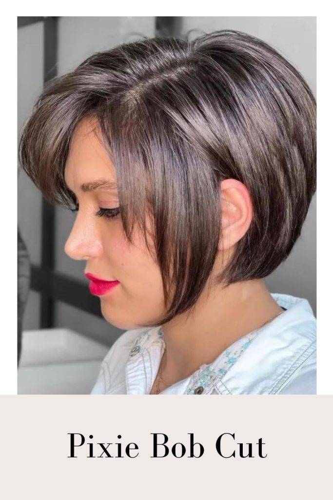 Woman in sky blue denim shirt with red lipstick and Pixie Bob Cut - bob hairstyles for older ladies