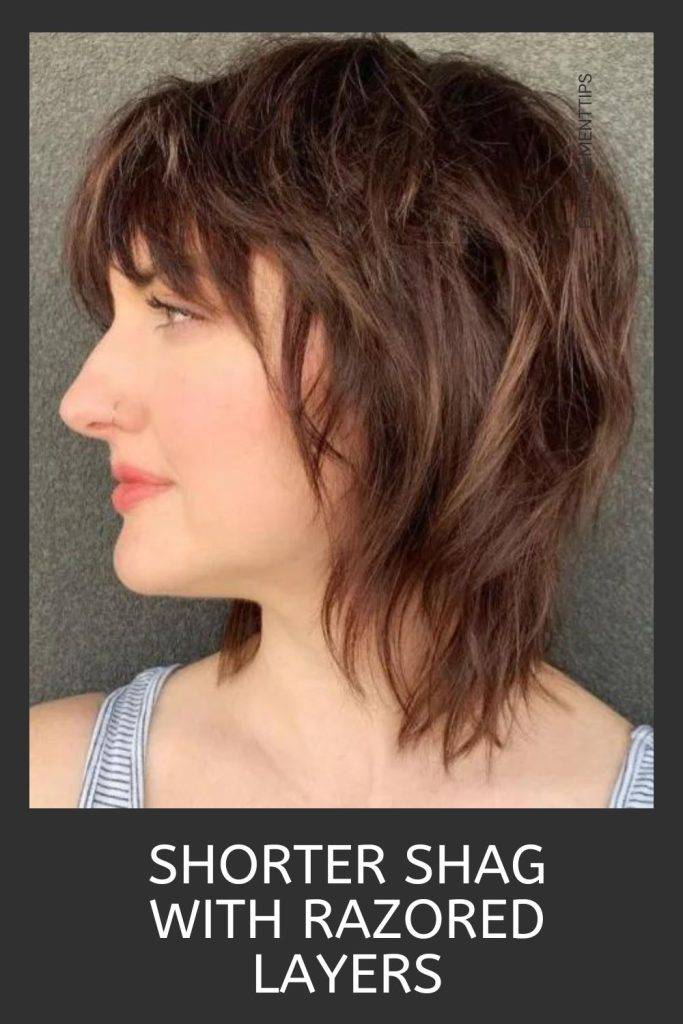 Woman in white and black lining tank top and short shag with razor layers  hairstyle - shag haircuts for thin hair