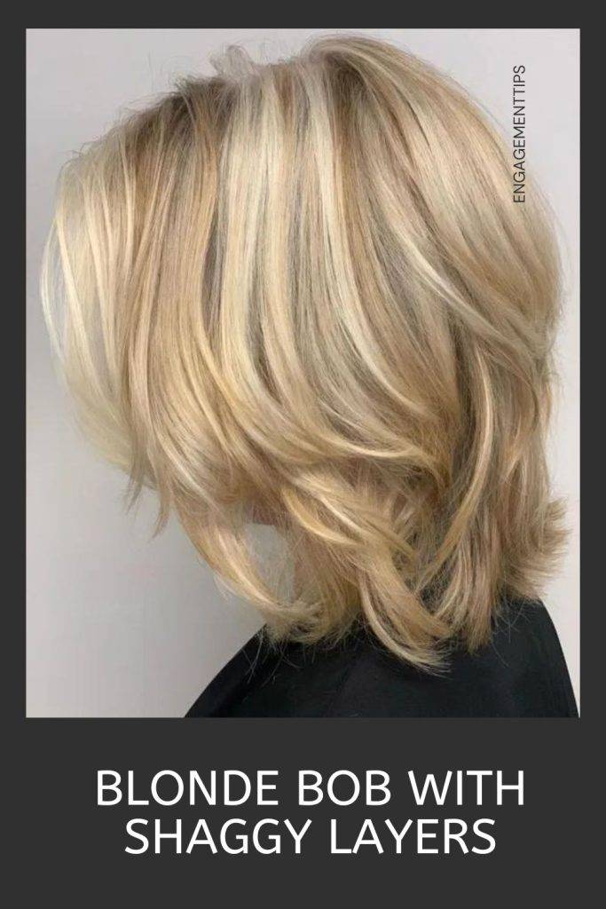 Woman in black dress showing the side view of her blonde bob with shaggy layers - shag haircut