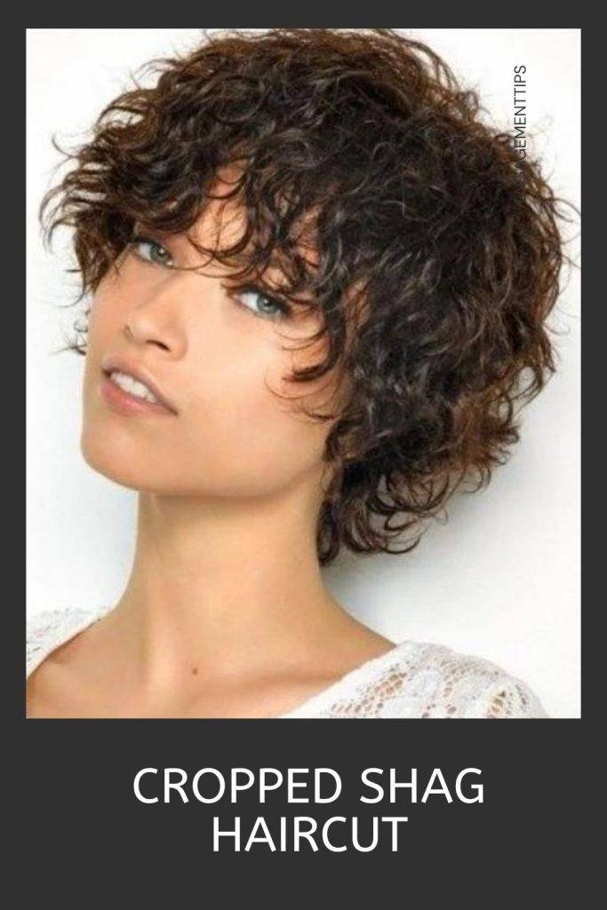 Woman in white top and cropped shag haircut - shag haircut
