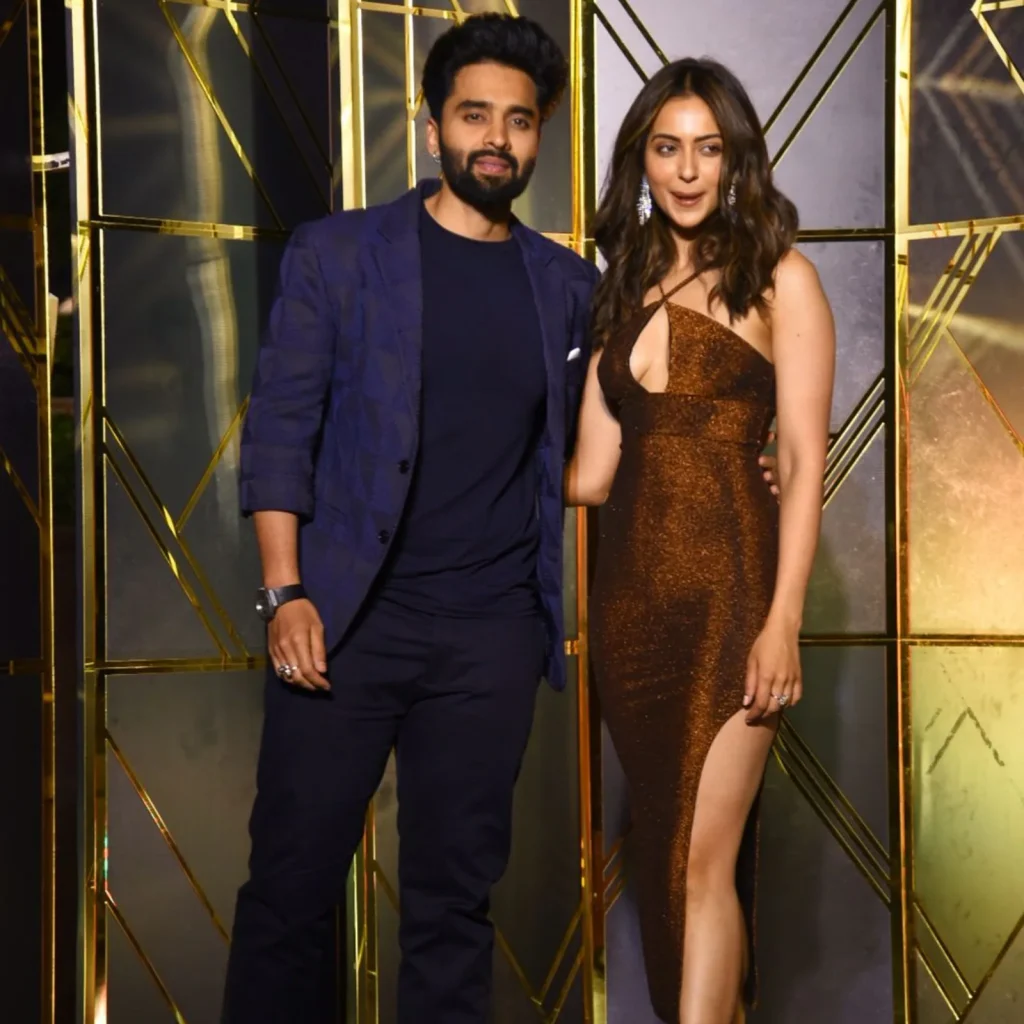 Jackky Bhagnani and Rakul Preet Singh posing in an event on stage - libra man and capricorn woman compatibility
