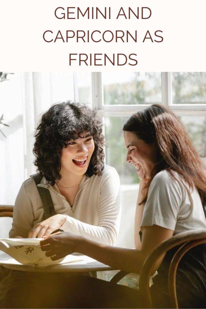 2 friends are talking and laughing together - compatibility of Gemini and Capricorn