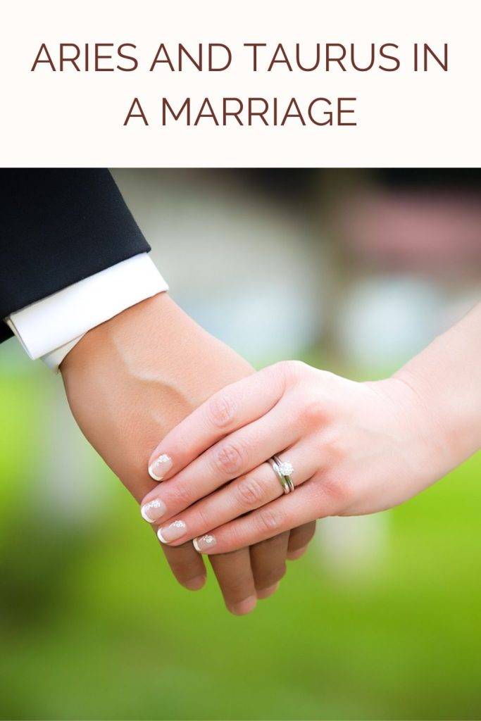 A couple walking hand in hand - Aries and Taurus marriage compatibility