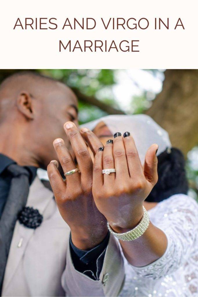 Newly married couple showing their wedding rings Newly married couple showing their wedding rings - Aries and Virgo marriage