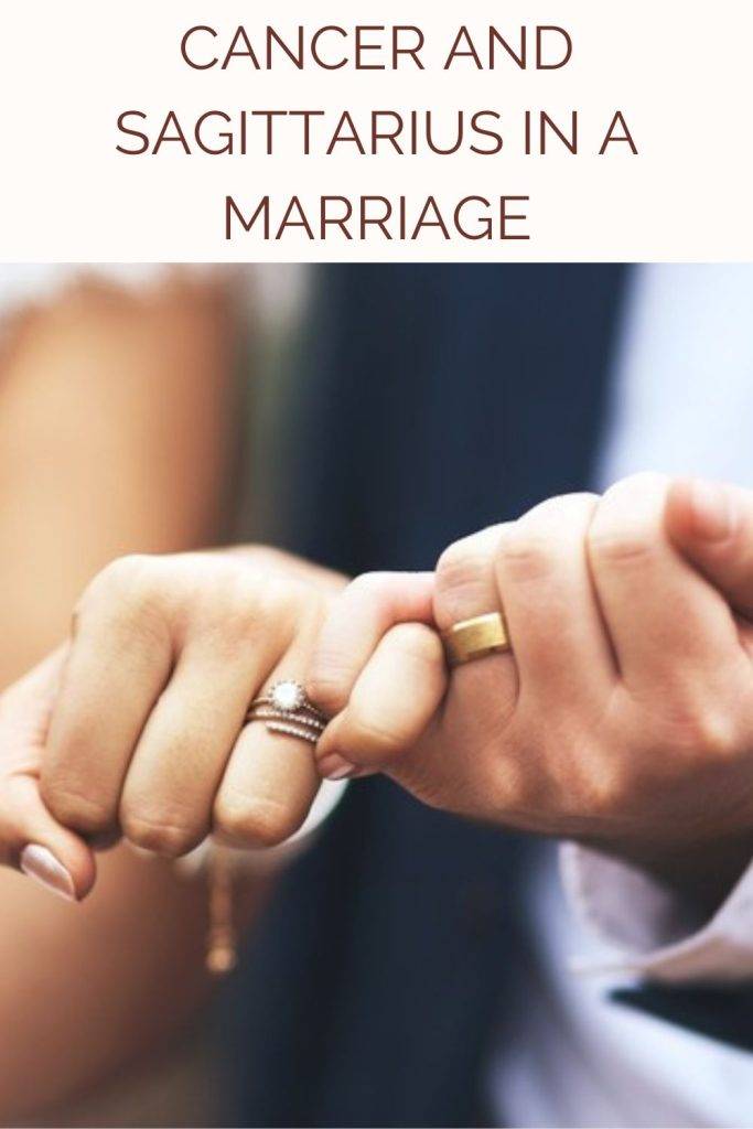 A couple is showing their wedding rings - Cancer and Sagittarius marriage compatibility