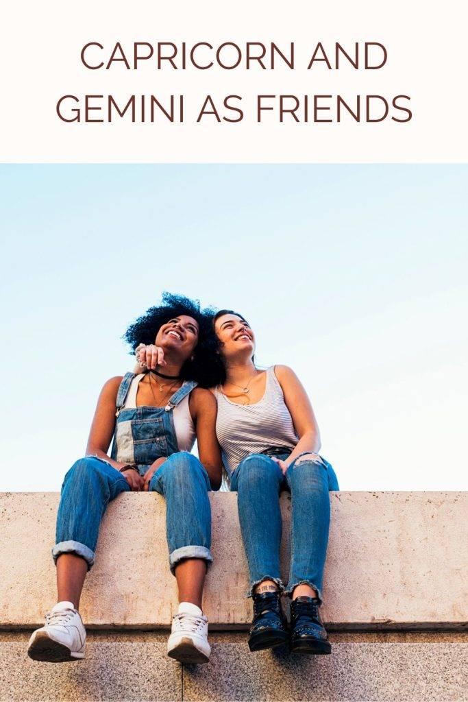2 friends sitting together - Capricorn and Gemini compatibility