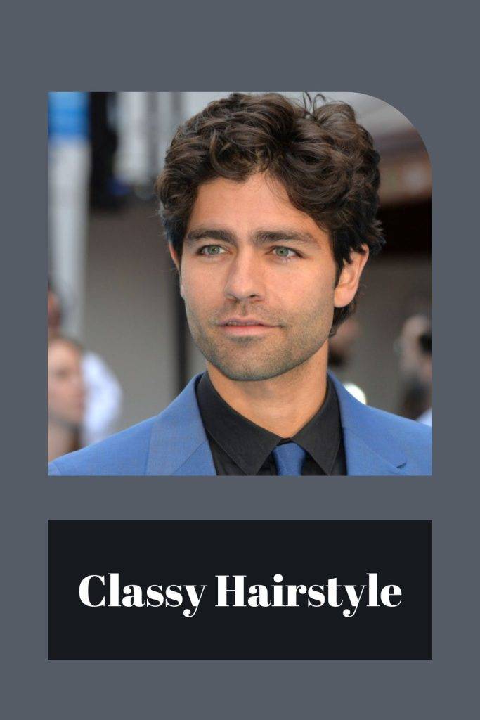 Man in blue coat  with matching tie and shirt showing his classy hairstyle - haircuts for men round face