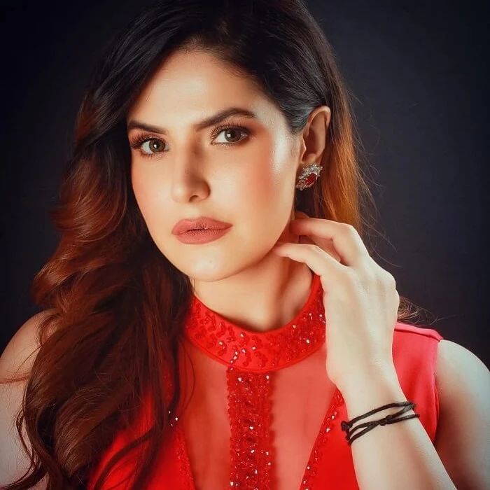 Indian model and actress Zareen Khan hair color red hairstyle