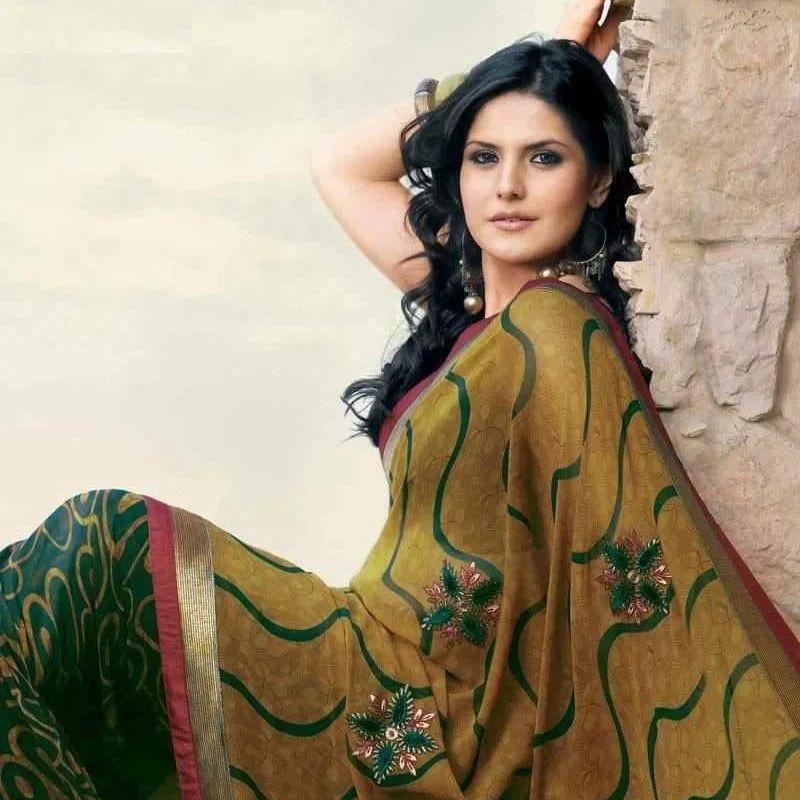 Indian model and actress Zareen Khan layered hairstyle in saree