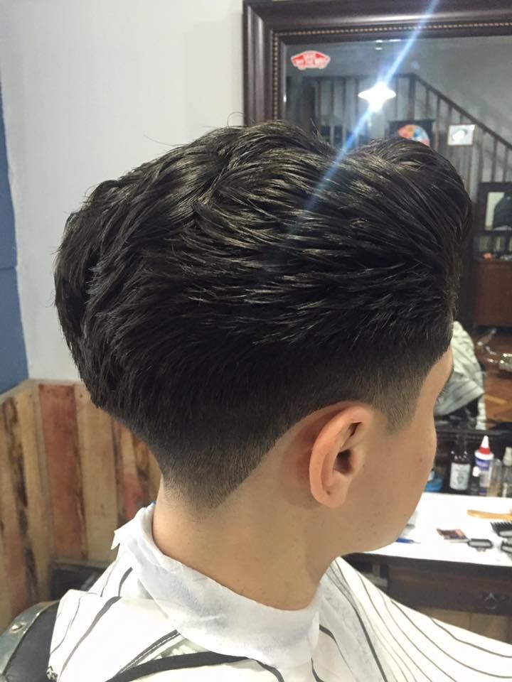 back view of stylish comb over hairstyle