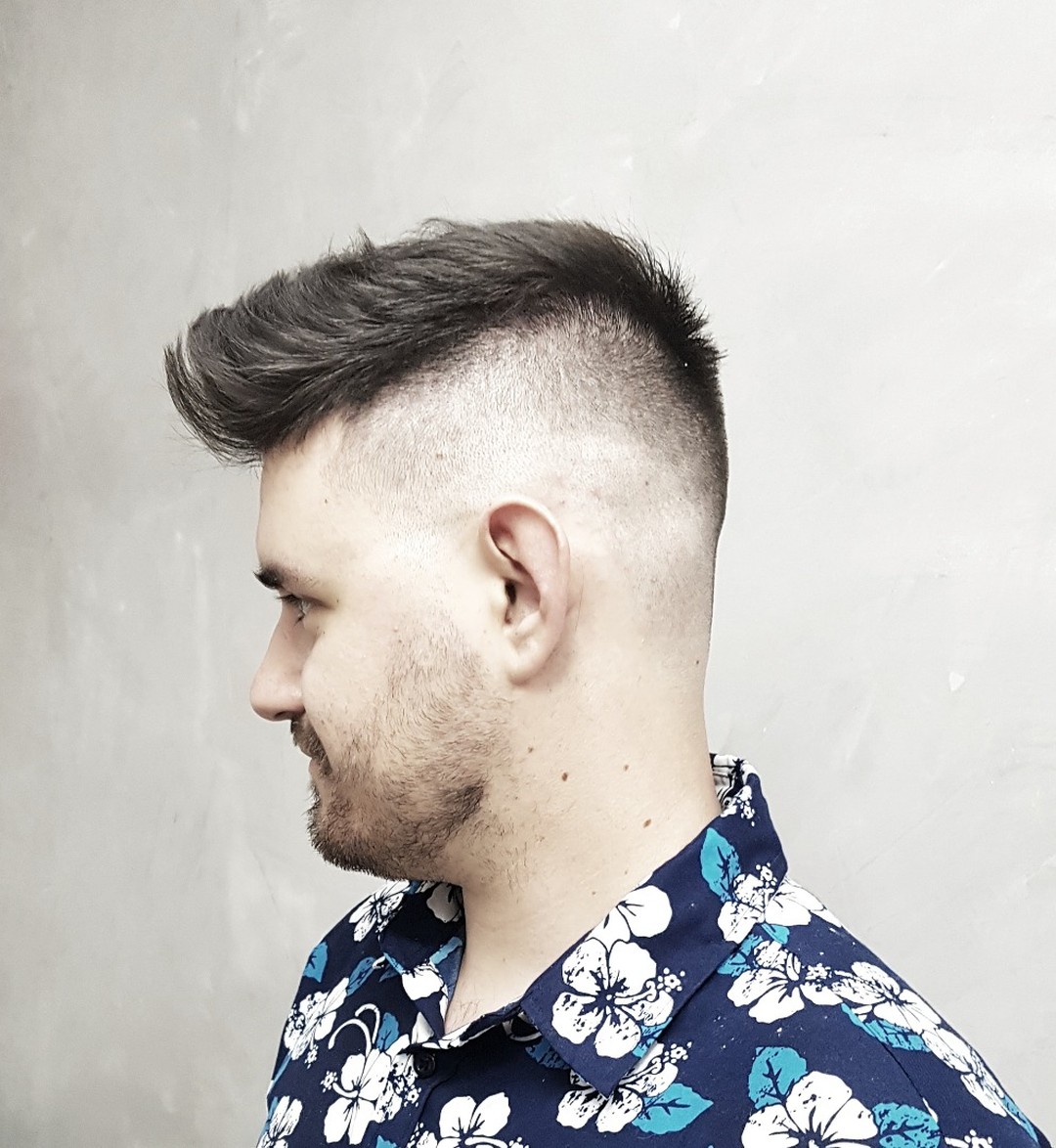 blended faux hawk hairstyle for men
