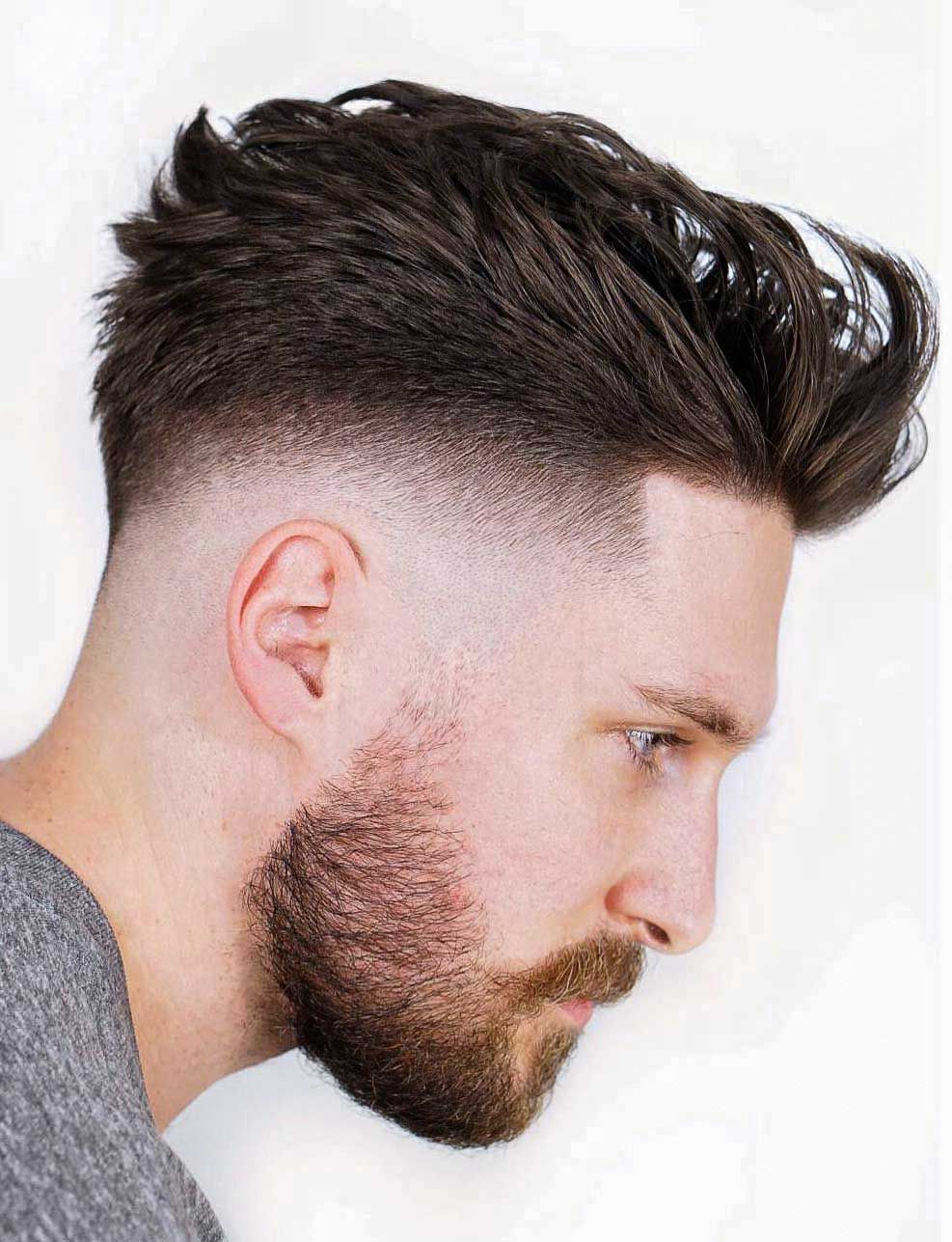 high fade medium faux hawk hairstyle for male