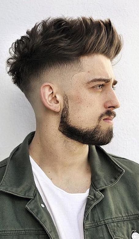 high fade long faux hawk hairstyle with beard