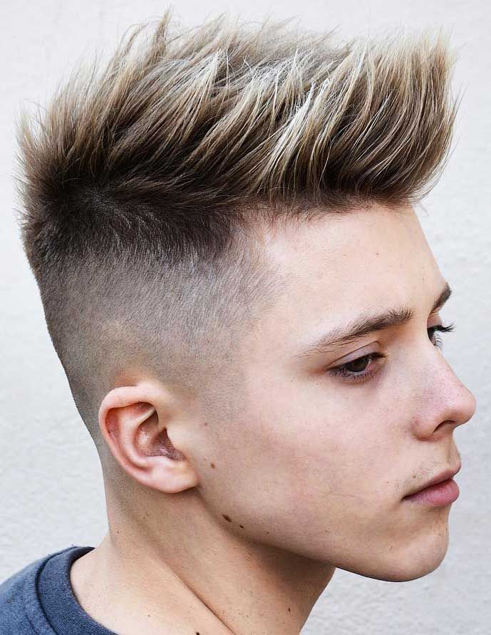 skin fade long faux hawk hairstyle for guys