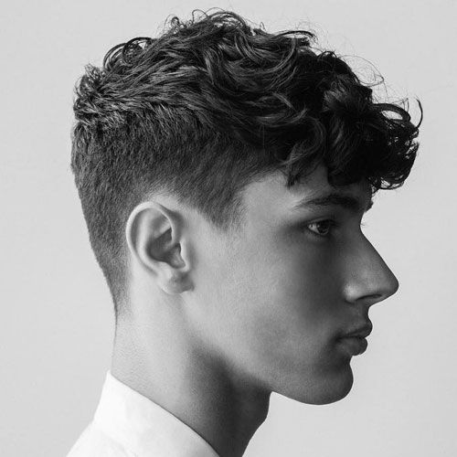 curly long faux hawk hairstyle