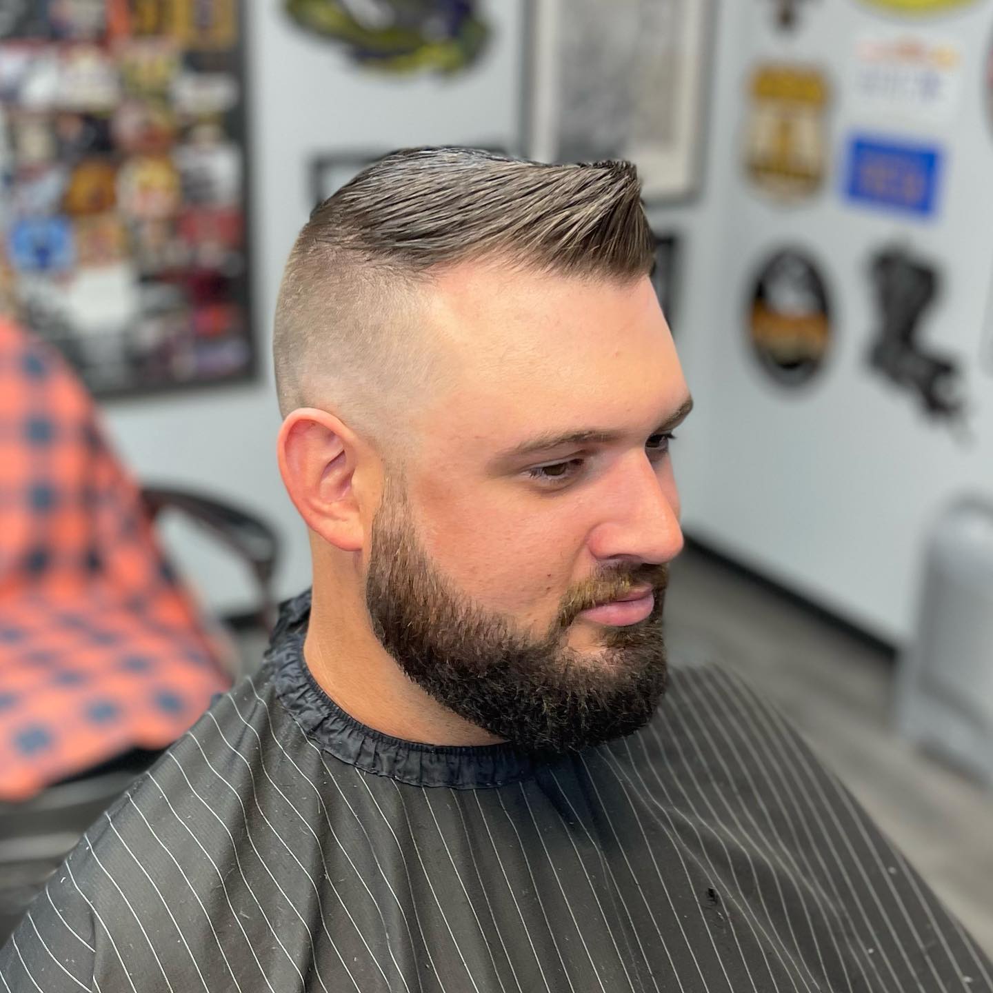 high fade side faux hawk hairstyle for guys